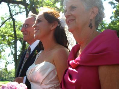 Debbie and her parents walk down the isle